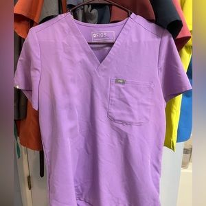 One pocket scrub top.